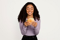 Hungry woman eating a hamburger