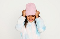 Happy kid in winter outfit, isolated on off white psd