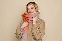 Blonde woman wearing a big scarf