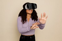 Woman experiencing virtual reality Metaverse through VR headset