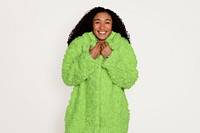 Woman wearing a warm teddy green coat