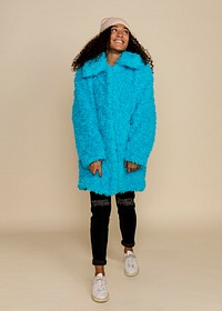 Funky woman wearing a warm blue teddy coat
