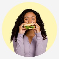 Woman eating hamburger, yellow badge