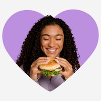 Woman eating hamburger, heart shape badge