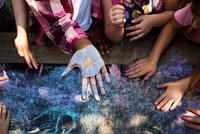 Blue chalk paint on kid hand