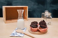 Homemade cupcakes with chocolate frosting and milk. Original public domain image from <a href="https://commons.wikimedia.org/wiki/File:Milk_and_Cupcakes_(Unsplash).jpg" target="_blank" rel="noopener noreferrer nofollow">Wikimedia Commons</a>