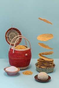Abstract shot of Mexican tortillas falling into a pile surrounded by fresh ingredients. Original public domain image from Wikimedia Commons