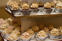 Tiers of mini cupcakes with caramel frosting. Original public domain image from <a href="https://commons.wikimedia.org/wiki/File:Stacks_of_Cupcakes_(Unsplash).jpg" target="_blank" rel="noopener noreferrer nofollow">Wikimedia Commons</a>