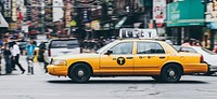 Taxi car in the city. Original public domain image from <a href="https://commons.wikimedia.org/wiki/File:New_York,_United_States_(Unsplash_S9qxkJN0f4Q).jpg" target="_blank">Wikimedia Commons</a>