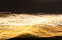Yellow light with long exposure effect. Original public domain image from Wikimedia Commons