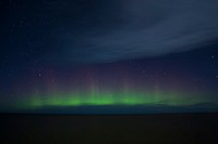 The Northern Lights across the sky as seen in Ontario.. Original public domain image from <a href="https://commons.wikimedia.org/wiki/File:Northern_Lights_Ontario_(Unsplash).jpg" target="_blank" rel="noopener noreferrer nofollow">Wikimedia Commons</a>