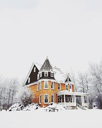 An elegant house with a turret covered in snow in winter. Original public domain image from <a href="https://commons.wikimedia.org/wiki/File:Elegant_house_under_snow_(Unsplash).jpg" target="_blank" rel="noopener noreferrer nofollow">Wikimedia Commons</a>