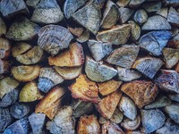 Close up of a pile of firewood.<br /><br />Original public domain image from <a href="https://commons.wikimedia.org/wiki/File:Firewood_texture_(Unsplash).jpg" target="_blank">Wikimedia Commons</a>