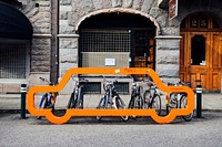 Creative street art for bike station. Original public domain image from Wikimedia Commons