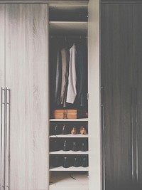 Wardrobe with suits. Original public domain image from <a href="https://commons.wikimedia.org/wiki/File:Wilmslow,_United_Kingdom_(Unsplash).jpg" target="_blank" rel="noopener noreferrer nofollow">Wikimedia Commons</a>