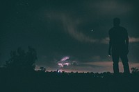 Man looking at the stars in the sky. Original public domain image from Wikimedia Commons