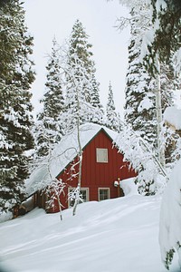 A snow covered house shaped as a trial on a winter hill in Solitude Nordic Center in Utah. Original public domain image from <a href="https://commons.wikimedia.org/wiki/File:Solitude_ski_resort_(Unsplash).jpg" target="_blank" rel="noopener noreferrer nofollow">Wikimedia Commons</a>