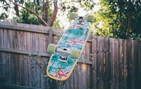 A colorful skateboard suspended in the air upside-down. Original public domain image from <a href="https://commons.wikimedia.org/wiki/File:Colorful_skateboard_(Unsplash).jpg" target="_blank" rel="noopener noreferrer nofollow">Wikimedia Commons</a>