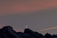 Dark sky with a small crescent moon. Original public domain image from Wikimedia Commons