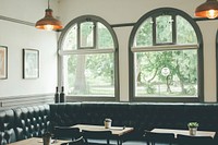 Arched windows in an empty café. Original public domain image from Wikimedia Commons