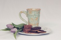 Biscuits and tea for the afternoon. Original public domain image from <a href="https://commons.wikimedia.org/wiki/File:Aliis_Sinisalu_2016-03-03_(Unsplash).jpg" target="_blank">Wikimedia Commons</a>
