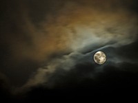 A cloudy night sky with a full moon. <br /><br />Original public domain image from <a href="https://commons.wikimedia.org/wiki/File:Zoltan_Tasi_2017-02-27_(Unsplash).jpg" target="_blank">Wikimedia Commons</a>