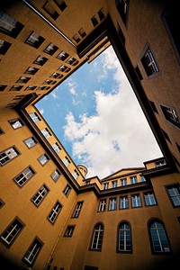 Vintage yellow apartment building. Original public domain image from <a href="https://commons.wikimedia.org/wiki/File:Germany_(Unsplash_ES-GvExYn3s).jpg" target="_blank">Wikimedia Commons</a>