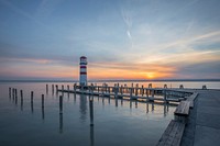 Lighthouse, boardwalk, pier, bridge, sea. Original public domain image from Wikimedia Commons