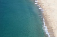 Blue ocean shoreline, drone view. Original public domain image from <a href="https://commons.wikimedia.org/wiki/File:Zenith_Beach,_Shoal_Bay,_Australia_(Unsplash).jpg" target="_blank">Wikimedia Commons</a>