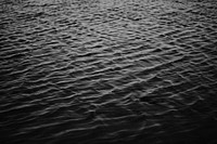 Black and white shot of water ripples in ocean. Original public domain image from <a href="https://commons.wikimedia.org/wiki/File:Monochrome_ocean_ripples_(Unsplash).jpg" target="_blank" rel="noopener noreferrer nofollow">Wikimedia Commons</a>