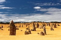A large number of rock outcroppings in a desert. Original public domain image from <a href="https://commons.wikimedia.org/wiki/File:Desert_Rock_Spires_(Unsplash).jpg" target="_blank" rel="noopener noreferrer nofollow">Wikimedia Commons</a>
