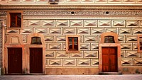 A building in Prague with intricate cultural and geometrical designs.. Original public domain image from Wikimedia Commons