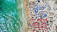 Crowded beach with vacationers, drone view. Original public domain image from <a href="https://commons.wikimedia.org/wiki/File:Vertical_from_above_(Unsplash).jpg" target="_blank">Wikimedia Commons</a>