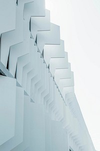 A side view of a white facade in Madrid. Original public domain image from <a href="https://commons.wikimedia.org/wiki/File:Madrid_architecture_facade_(Unsplash).jpg" target="_blank" rel="noopener noreferrer nofollow">Wikimedia Commons</a>