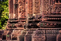 Temple that is etched with an intricate design in Banteay Srei, Cambodia. Original public domain image from <a href="https://commons.wikimedia.org/wiki/File:Banteay_Srei_temple_(Unsplash).jpg" target="_blank">Wikimedia Commons</a>