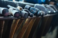 Hammers and other tools arranged in a row. Original public domain image from <a href="https://commons.wikimedia.org/wiki/File:Same_but_different_(Unsplash).jpg" target="_blank" rel="noopener noreferrer nofollow">Wikimedia Commons</a>