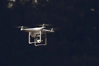 A DJI Phantom drone in flight. Original public domain image from Wikimedia Commons