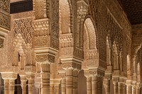 Columns and arches in the Patio de los Leones, Alhambra, Granada, Andalusia, Spain. Original public domain image from Wikimedia Commons