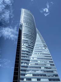 Close up of the Torre Espacio in Madrid, Spain. Original public domain image from <a href="https://commons.wikimedia.org/wiki/File:Torre_espacio_1.jpg" target="_blank" rel="noopener noreferrer nofollow">Wikimedia Commons</a>