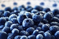 Close-up of many wet blueberries. Original public domain image from Wikimedia Commons