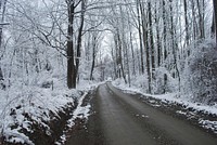 Looking down a rural dirt road after a bout of snowfall in Dutchess County, New York, USA. Original public domain image from Wikimedia Commons