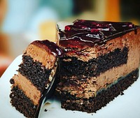 A slice of chocolate cake with a layer of jam on top. Original public domain image from <a href="https://commons.wikimedia.org/wiki/File:Pexels-abhinav-goswami-291528.jpg" target="_blank" rel="noopener noreferrer nofollow">Wikimedia Commons</a>