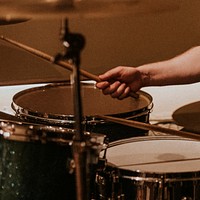 Drummer playing drums closeup HD image