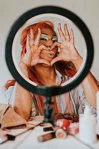 Beautiful drag queen posing for photos, beauty blogger