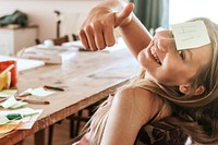 Girl with sticky note on forehead, homeschooling in the new normal