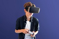 Young boy playing VR game, entertainment technology