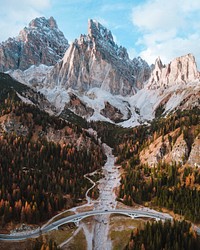 Autumnal forest and the beautiful Italian Dolomites