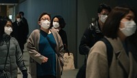 Commuters wearing disposable masks hoping to prevent the spread of corona virus (COVID-19) on February 27th, 2020. Yokohama, Japan.