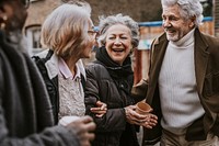 Retired friends meeting in the city 