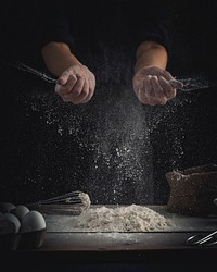 Free baker with wheat flour image, public domain CC0 photo.
